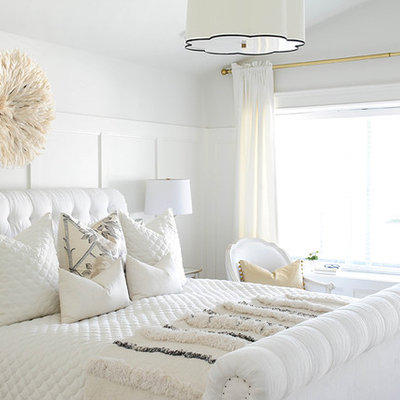 Transitional master carpeted bedroom photo in Vancouver with white walls