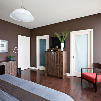 Bedroom - traditional dark wood floor and brown floor bedroom idea in Toronto with brown walls