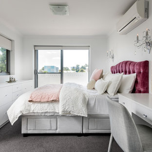 Photo of a small contemporary bedroom in Perth with white walls, carpet and grey floor.