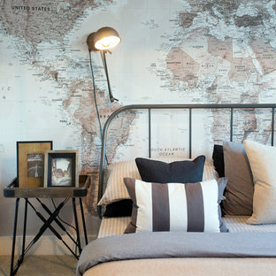 Inspiration for an industrial guest bedroom in Manchester with carpet and beige floors.