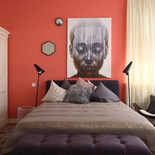 Diseño de dormitorio contemporáneo con parades naranjas