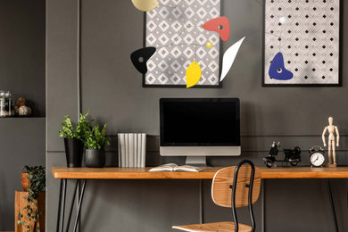 Diseño de despacho contemporáneo de tamaño medio con escritorio independiente