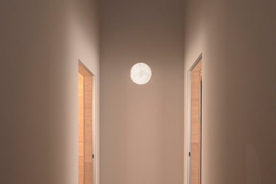 Esempio di una camera da letto minimal con pavimento in tatami e pavimento beige