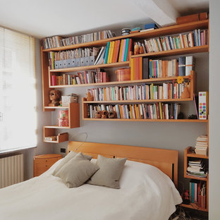 Idee per una camera da letto contemporanea con pareti grigie