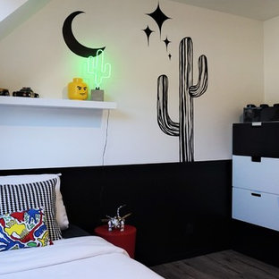 Idées déco pour une chambre d'enfant contemporaine avec un mur noir.