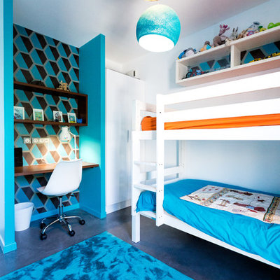 Mid-sized trendy boy concrete floor and gray floor kids' room photo in Montpellier with blue walls