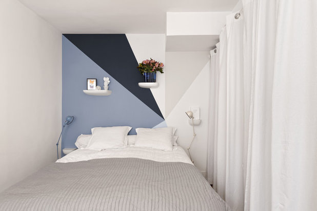Contemporary Bedroom by Multiarchi