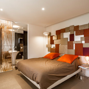 Idées déco pour une petit chambre contemporaine avec un mur blanc et un sol gris.