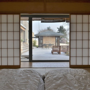 Ejemplo de dormitorio principal, de estilo zen, grande, con tatami
