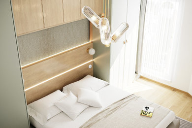 Idée de décoration pour une chambre parentale tradition de taille moyenne avec un mur blanc, parquet clair et un sol beige.