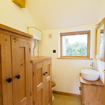 A Guesthouse With A Small Yet Beautiful Oak Kitchen And Cloakroom