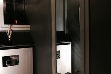 Photo of a contemporary cloakroom in Surrey.
