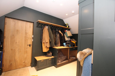 Design ideas for a medium sized farmhouse cloakroom in Oxfordshire with recessed-panel cabinets.