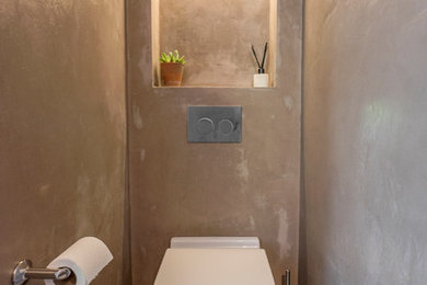 Design ideas for a small contemporary cloakroom in London.