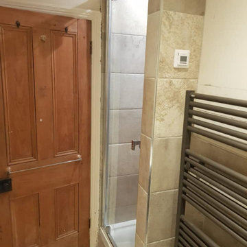 Galley shower room in period property
