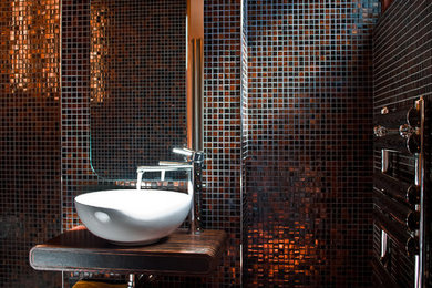 Inspiration for a contemporary cloakroom in Other with mosaic tiles, a vessel sink and multi-coloured tiles.