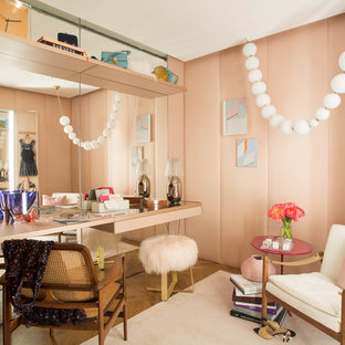 Inspiration for an eclectic women's medium tone wood floor dressing room remodel in New York