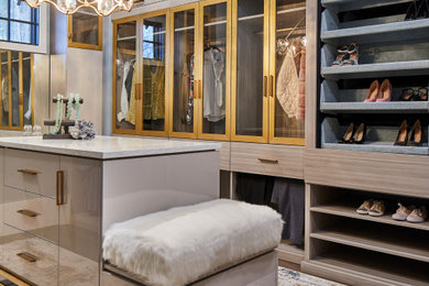 Example of a trendy closet design in Charlotte