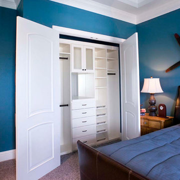 Antique White Premier Recessed Panel Closet Organizers in Light Blue Closet