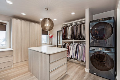 Design ideas for a modern wardrobe in Edmonton.