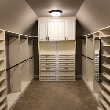 Beautiful Antique White Walk-In Closet with Angled Walls