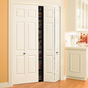 Inspiration for a tropical light wood floor walk-in closet remodel in Tampa with open cabinets and white cabinets