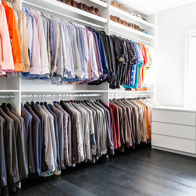 Dressing room - large contemporary men's dark wood floor dressing room idea in Toronto with open cabinets