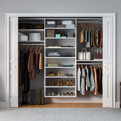 Inspiration for a small contemporary gender-neutral reach-in closet remodel in Hawaii with white cabinets