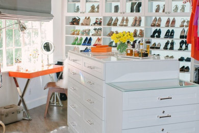 Inspiration for a shabby-chic style women's light wood floor walk-in closet remodel in Los Angeles with white cabinets and shaker cabinets