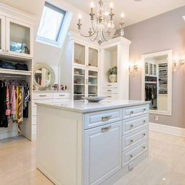CHIC HER MASTER CLOSET WITH ANGLED CEILINGS
