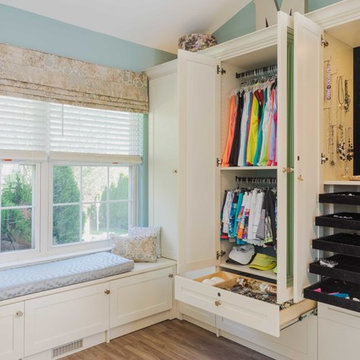 Chic Walk-In Closet And Sitting Room With Storage Options
