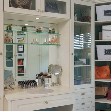 Chic Walk-In Closet Wiht Built In Vanity and Lighting