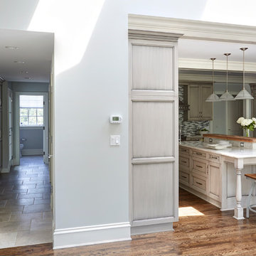 Classy Mudroom with Painted Grey Cabinetry