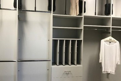 Closet - contemporary closet idea in Houston