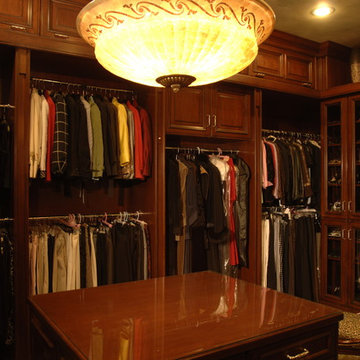Closets by Cabinets & Designs
