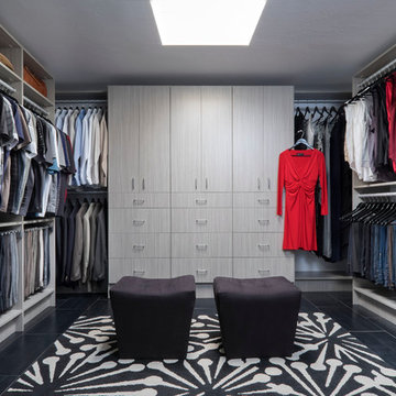 Concrete Walk-in Closet with Custom Wardrobe Centerpiece