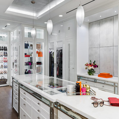 Dressing room - transitional women's brown floor dressing room idea in Toronto with glass-front cabinets and white cabinets