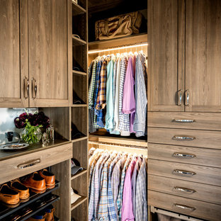 Transitional men's carpeted and gray floor walk-in closet photo with shaker cabinets and dark wood cabinets