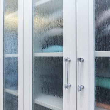 Crystal and polished chrome decorative hardware & beautiful laminate glass doors