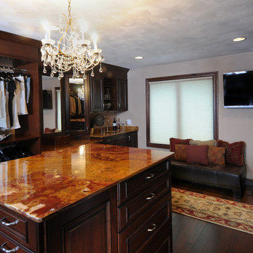 Crystal Chandilier over Onyx Countertop on Dark Stained Cherry Island in Master