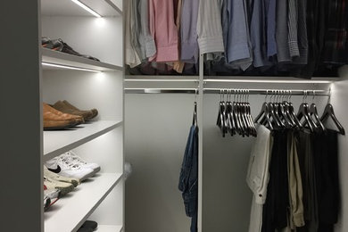 Inspiration for a modern closet remodel in Miami