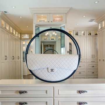 Custom Couture Master Closet in Winnetka Features Island with Purse Display