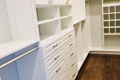 Example of a mid-sized classic closet design in Other
