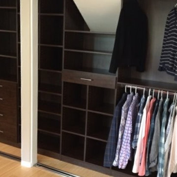 Dark wood his & hers reach-in closets