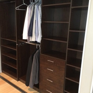 Dark wood his & hers reach-in closets