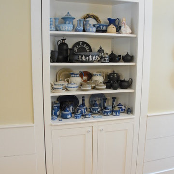 Dining room storage cupboard with a secret