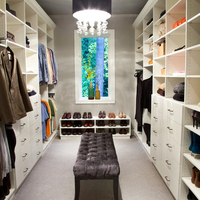 Dressing room - transitional carpeted dressing room idea in Los Angeles with open cabinets and white cabinets