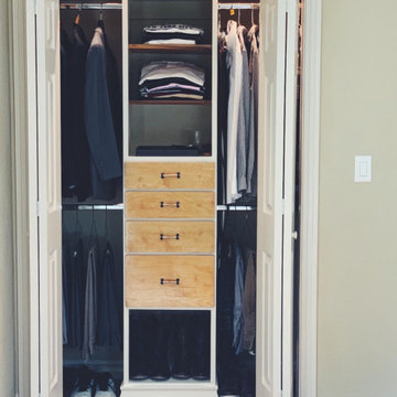 Elegant and functional closet for him.