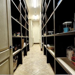 Tuscan closet photo in Houston