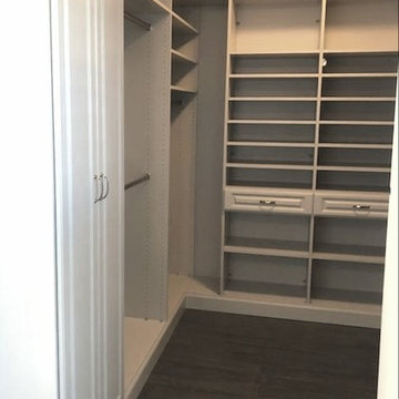 Grey Owner's Suite Closet